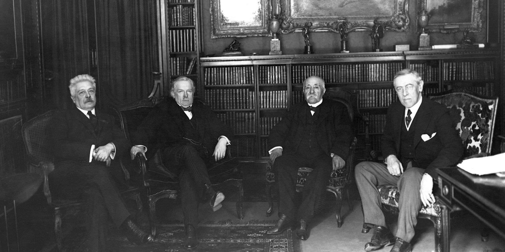 Vittorio Orlando, David Lloyd George, Georges Clemenceau, and Woodrow Wilson meet to discuss the Treaty of Versailles